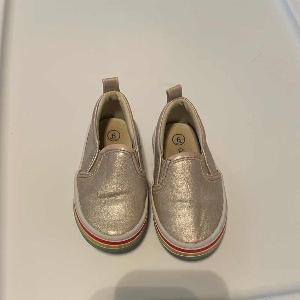 Size 6 sneakers and boots. Boots have a small pen mark on the inside
